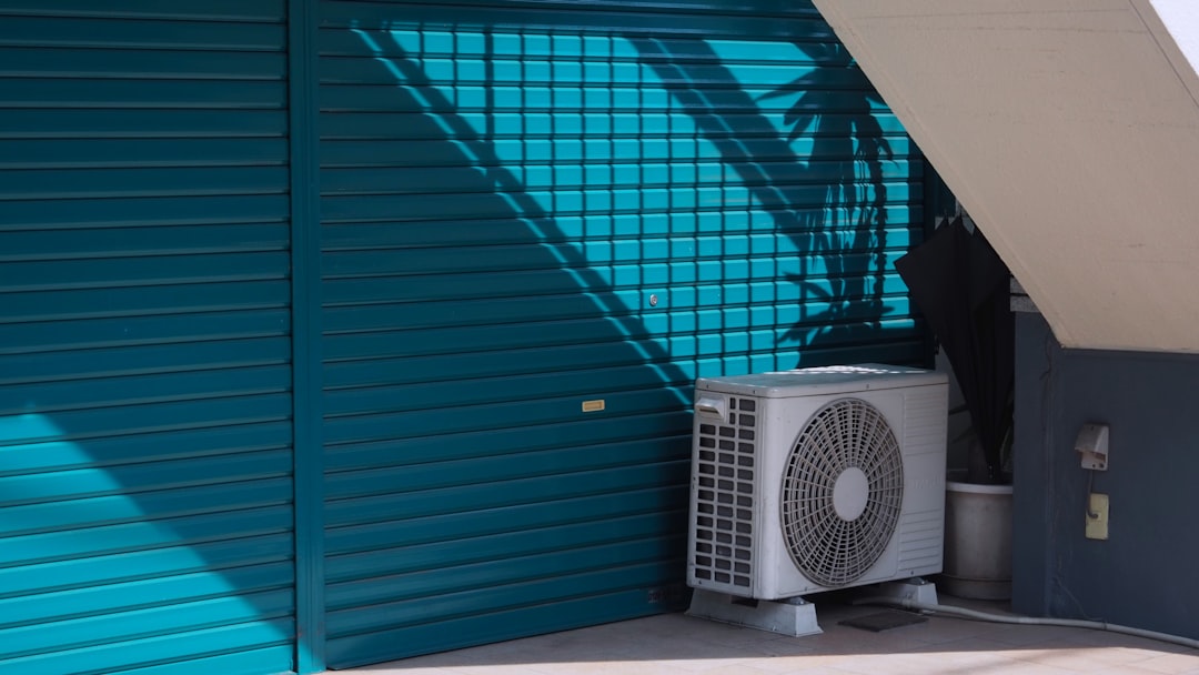 modern energy-efficient air conditioner unit installed outside a Utah home